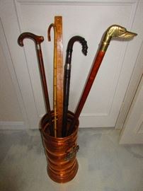 Copper umbrella/cane stand & walking sticks