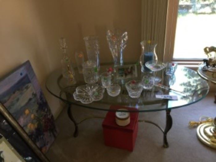Several glass items and glass coffee table.
