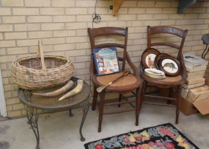 Wrought Iron Patio Table, Antique Chairs with Cane Seats, Collector's Plates, Gathering Basket