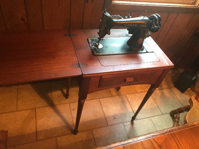 Antique sewing Machine in Cabinet