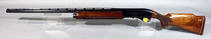 Remington Model 1100 12 Gauge Shotgun, SN# L939724V, Monte Carlo Stock, Extended Door, High-Rib, Ported BBL, Trap Gun