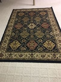 AREA RUG 63” x 91”