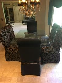 GLASS TOP DOUBLE PEDESTAL TABLE WITH 6 CHAIRS 
66” L x 45” W 