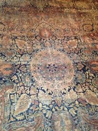 Large antique rug - 9 feet 9 inches x 14 feet 1 inch