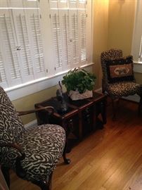 Animal print chairs; antique trunk