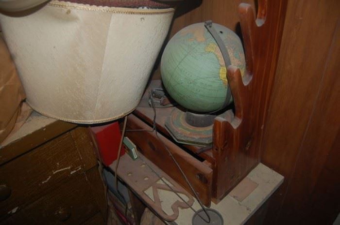 Old tin litho globe, gun rack, etc.