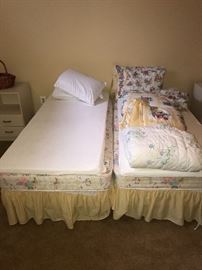 TWO-TWIN MATTRESSES / BOXSPRINGS WITH PADS AND FRAMES