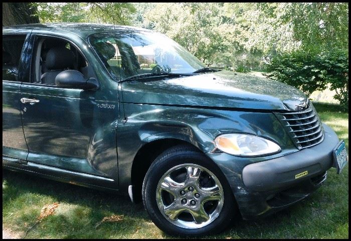 2001 PT CRUISER wagon with only 50,292 miles. There are dings and scrapes on the outside and it needs new tires, but has a new battery and would make a good  "back to school" car. Deluxe interior with sunroof.