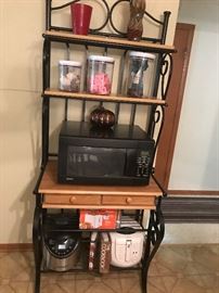 Baker's rack with microwave and accessories