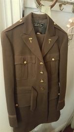 Mint condition World War 2 dress uniform with matching pants and 2 Dentist insignia