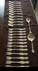 set of sterling art nouveau spoons and forks