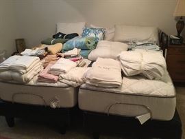 Bed is 2 XL twin that are together as a king bed - head and foot of each can be raised and lowered as per your preference. 