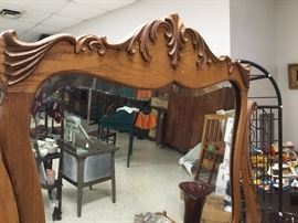 Close up of mirror on Antique oak dresser