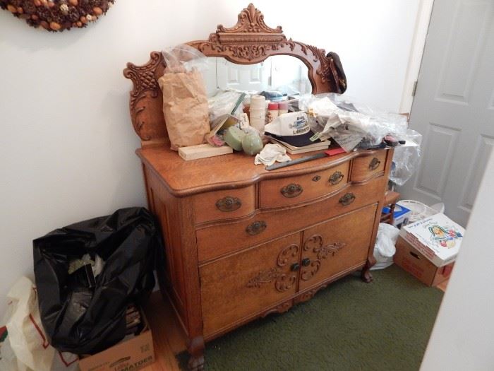 Highly decorated antique dresser
