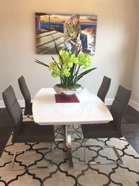 Gorgeous modern dining room set and rugs