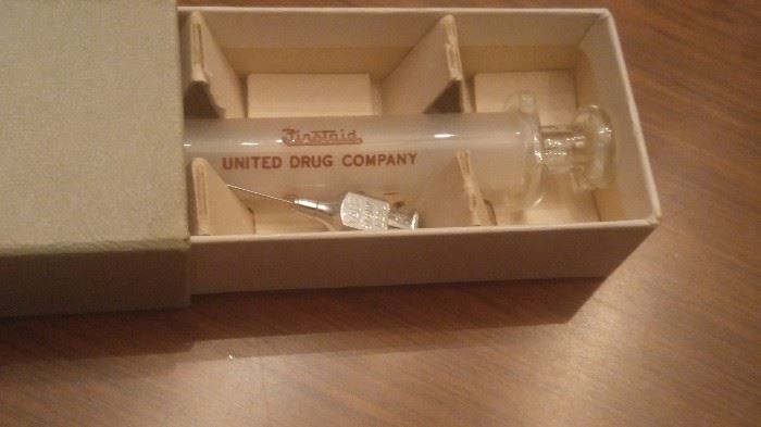 Glass vintage syringe