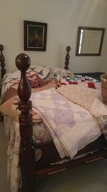 Antique quilts & rope bed