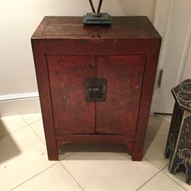 Pair of antique Chinese lacquered bedside cabinets.