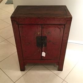 Pair of antique Chinese lacquered bedside cabinets.