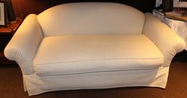 Cream colored, down filled sofa.  