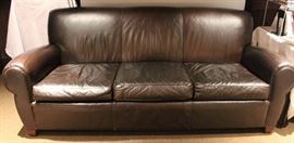 Mitchell Gold brown leather sofa.