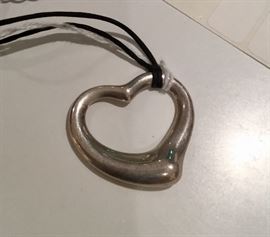 Tiffany & Co. sterling Peretti heart necklace. There are a number of pieces of Tiffany sterling jewelry in this sale.