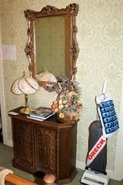 Slate-top cabinet, gilt mirror, Oreck vacuum