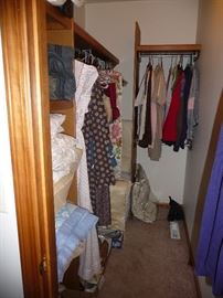 assorted clothes , shoes , bedding 