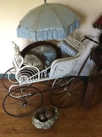Victorian Baby carriage with the umbrella