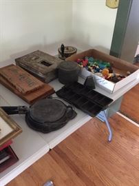 Some cast iron items, Fisher price people and furniture
