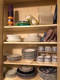 kitchen cabinet full of blue and white dinnerware
