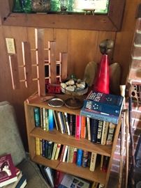 a Karl Wuestefeld candelabra on top of the books