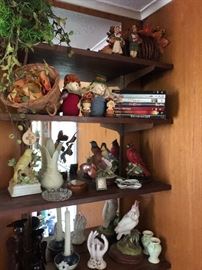 a shelf full of decorative porcelain items and a few Thanksgiving pieces