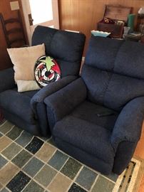 a pair of blue contemporary comfortable recliners
