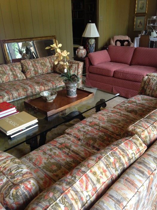 Two matching 3-cushion sofas