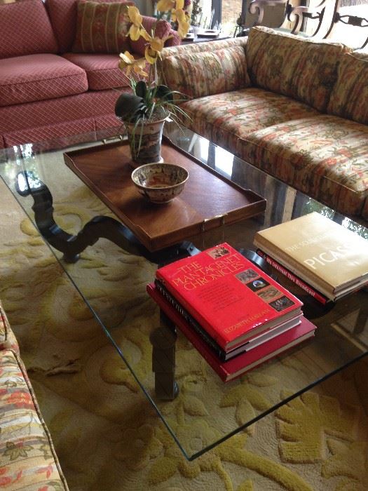 Large glass top coffee table; great coffee table books; wooden tray