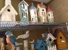 Bird houses and carved birds