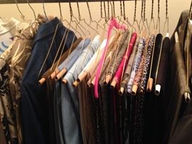 Numerous jackets and slacks