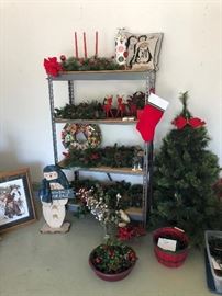 Garage is filled with seasonal items including greens, wreathes, Christmas trees, decorations, Dept. 56 Villages, SnowBabies, serving pieces and much more!