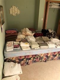Lots of bedding, primarily queen but some twin/full; wool blankets, towels (individual and sets); pillows