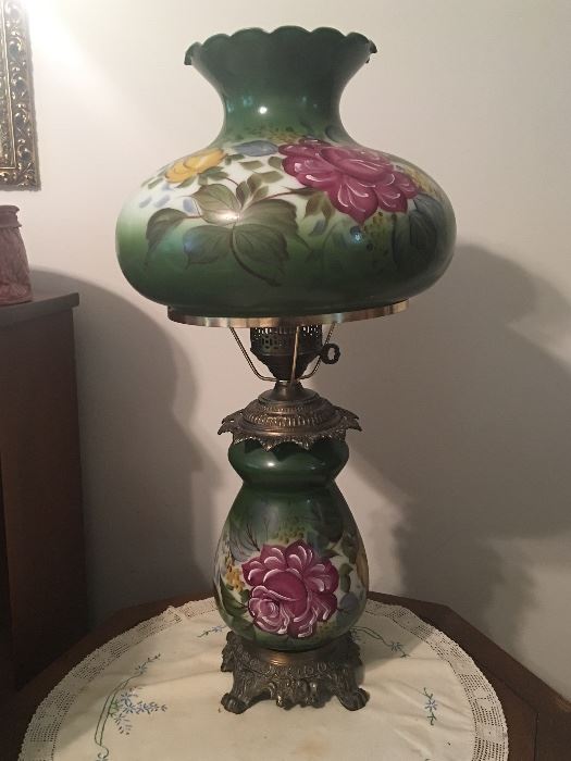 Lovely hand painted vintage lamp that lights on both the top and the bottom. 
