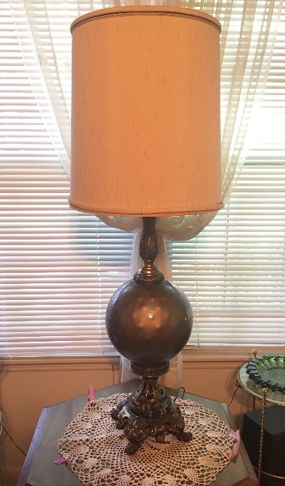Very unique vintage lamp with a a round glass globe