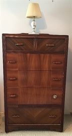 A very nice solid dresser and an petite bedside lamp