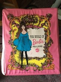 Vintage Barbie case with vintage clothing