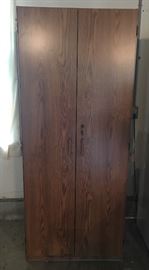 Tall pantry cabinet with key