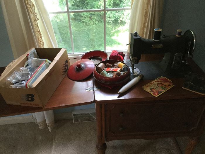 Vintage White Rotary Electric Sewing Machine, Cabinet    http://www.ctonlineauctions.com/detail.asp?id=737646