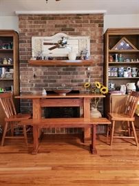 Pennsylvania Amish made solid oak table, bench and three chairs.