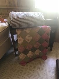 Vintage quilts and quilt rack