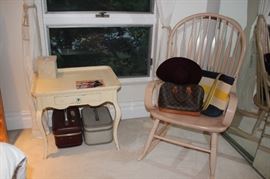 Small Table and Spindle Back Chair with Assorted Small Luggage and Handbags