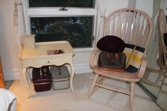 Small Table and Spindle Back Chair with Assorted Small Luggage and Handbags